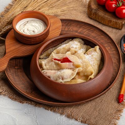 Вареники с вишней в Русская кухня по цене 590 ₽