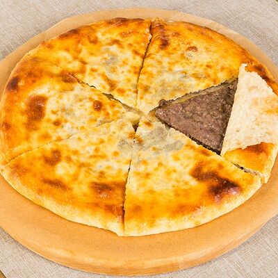 Осетинский пирог с телятиной и грузинскими специями на компанию в Лариса Ивановна по цене 965 ₽