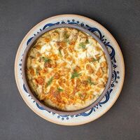 Запечённый молодой картофель с белыми грибами в NANA Pirveli