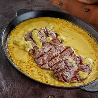 Лукум в соусе кафе де-пари в Cihan Turkish Steak and Kebab