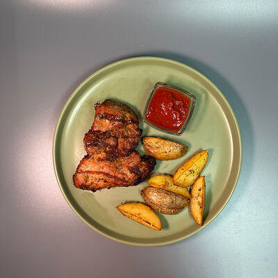 Свиная шея с запеченным картофелем в Парнас по цене 690 ₽