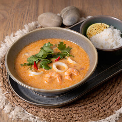 Том ям на кокосовых сливках с креветками и кальмаром в Белок по цене 950 ₽