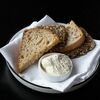 Хлебная корзина с анчоусным маслом в STG CAFE по цене 280