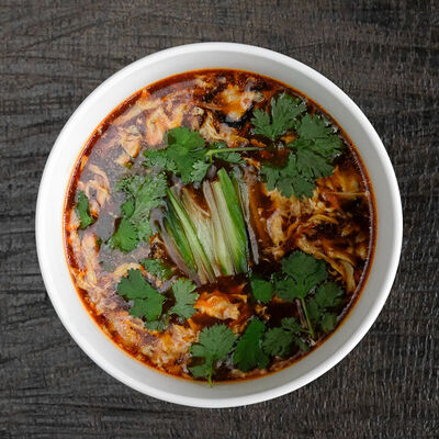 Кисло-острый суп в Double Duck по цене 1450 ₽