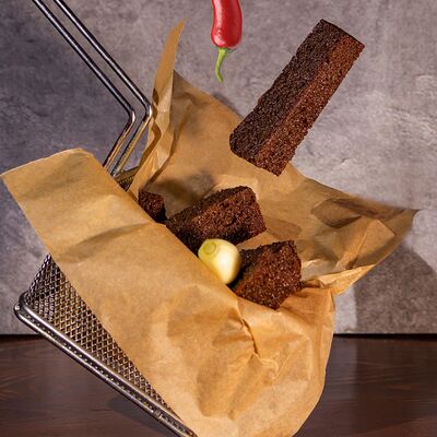 Фирменные гренки в Рыцарь Beer по цене 370 ₽