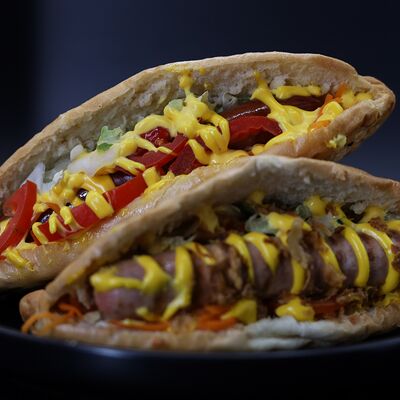 Хот-дог с молочной сосискойв Вкус Востока по цене 170 ₽