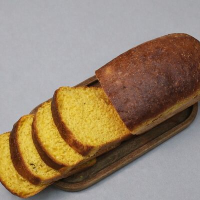 Хлеб тыквенный с сухофруктами в Мёд и Масло по цене 261 ₽