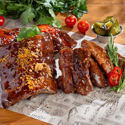 Свиные ребрышки в соусе апельсиновый Джек Дениэлс в BBQ beer restaurant по цене 1070 ₽