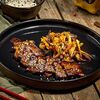 Свинина тясю с овощами и рисом в Chinki Izakaya по цене 750