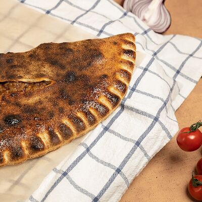 Кальцоне по-грузински с мясом в Пицца и Паста по цене 735 ₽