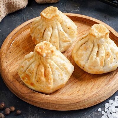 Хинкали жареные с говядиной и бараниной в Чинтамани по цене 550 ₽