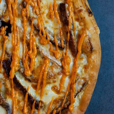 Пицца с копченым угрём в Тобико по цене 1700 ₽