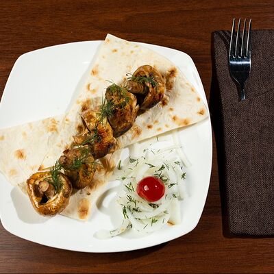 Грибы на мангале в Kebab King Halal по цене 240 ₽