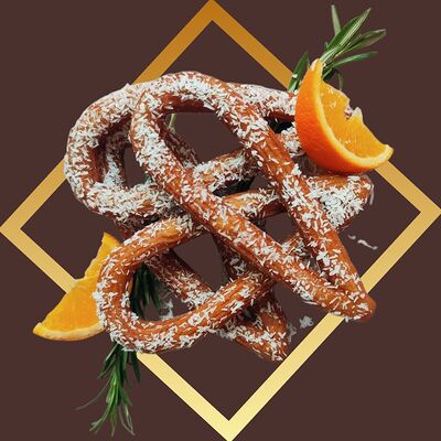 Чуррос Loops в кокосовой глазури и стружкев Churreria Comida Mexicana по цене 18 р.