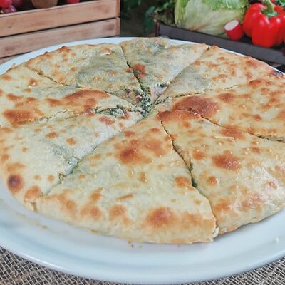 Пирог с зеленью Цахараджын большой в Шафран по цене 855 ₽