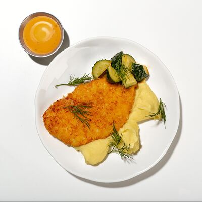 Шницель куриный с фирменным соусомв Jijoo по цене 430 ₽