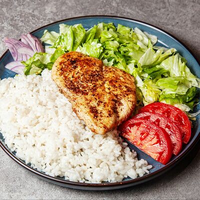 Стейк из куриного филе с рисом в ГироГирос по цене 900 ₽