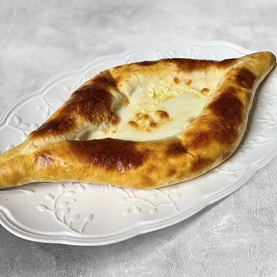 Хачапури с сыром раклет в MaMa Mia по цене 688 ₽