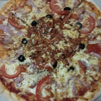 Пицца Цыпленок барбекю в Oscar по цене 700 ₽