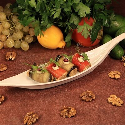 Рулетики из баклажана и сладкого перца с начинкой из грецкого ореха в Чичилаки по цене 620 ₽