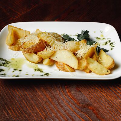 Картофельные долькив Шиканландия по цене 190 ₽