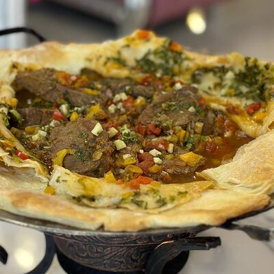 Томленая говядина в слоеном тесте в Crystal по цене 3420 ₽