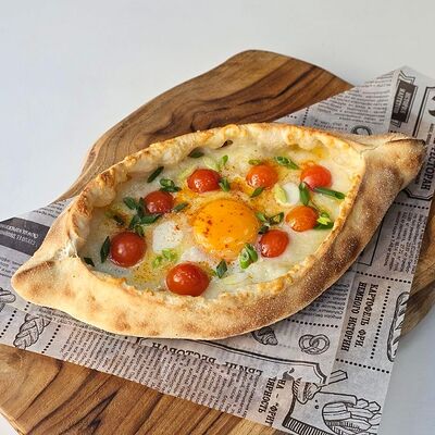 Хачапури с помидором в Tochi Food по цене 585 ₽