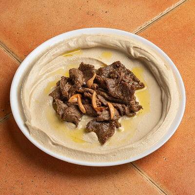 Хумус с мясом в Кафе Аль-карамарабская кухня по цене 490 ₽