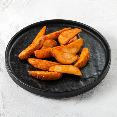 Картофельные дольки в Гриль-паб ЕрмолаевЪ по цене 315 ₽