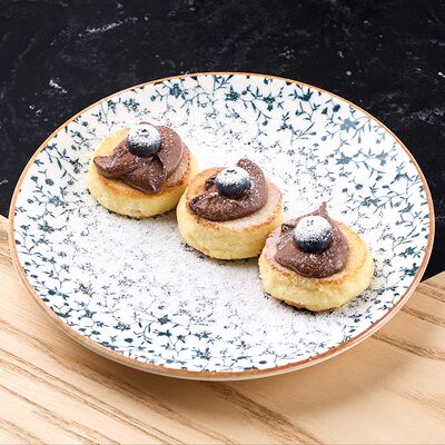 Сырники с Нутеллойв Binz по цене 490 ₽