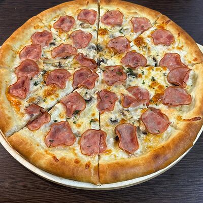 Пицца Ветчина-грибы в YAKUZA по цене 700 ₽