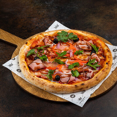 Пицца Мясная в Город детей по цене 943 ₽