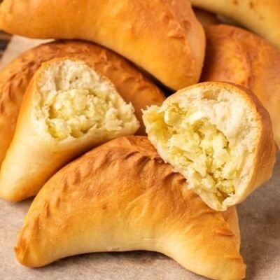 Пирожок с капустой и яйцомв Дом хлеба по цене 89 ₽