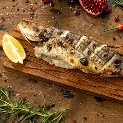 Сибас на мангале в Вкусно есть всё на углях по цене 1530 ₽