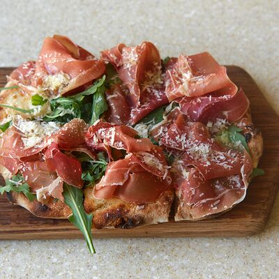 Пицца с прошутто крудо в Romanico по цене 1180 ₽