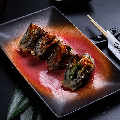 Онигири с угрем в Том и ям по цене 680 ₽