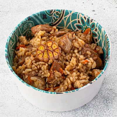 Плов с курицей в Тарелка по цене 323 ₽