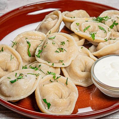 Пельмени с говядиной ручной лепки в Yunga Tim Fish & Grill по цене 940 ₽