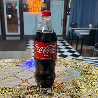 Coca-Cola в Жасмин по цене 200 ₽