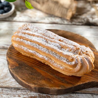 Эклер с заварным кремом в Пиросетия Осетинские пироги по цене 155 ₽