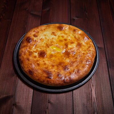 Осетинский пирог с сыром в Хинкальная Легенда по цене 800 ₽