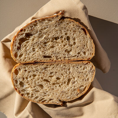 Домашний хлеб на закваске в Grain по цене 290 ₽