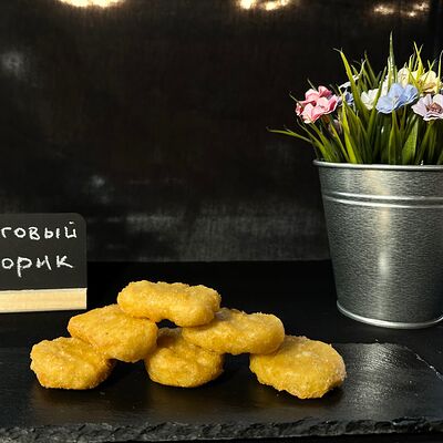 Наггетсы куриные в Торговый дворик по цене 310 ₽