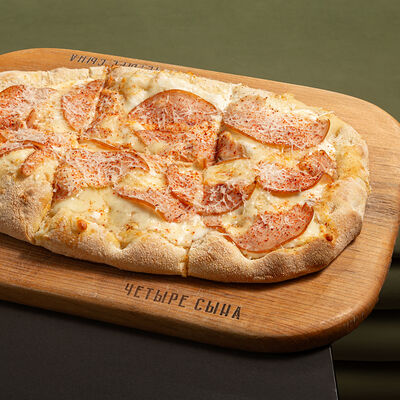 Пицца Копченая курица в ЧЕТЫРЕ СЫНА по цене 890 ₽