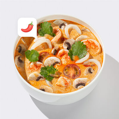 Том Ям с кальмаром и креветками в Много лосося по цене 645 ₽