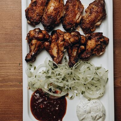 Куриные крылья в The Кухня по цене 490 ₽