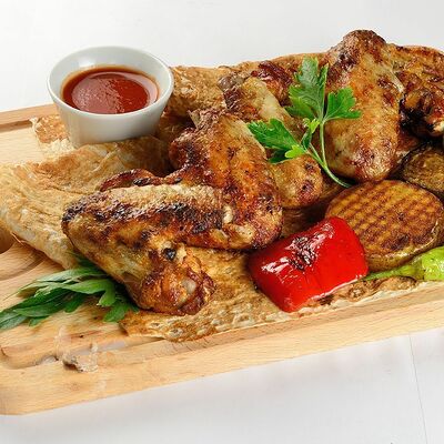 Куриные крылышки в Строгинский шашлык 24 по цене 350 ₽