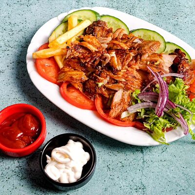 Порцион в тарелке в Istanbul shef doner 24 по цене 520 ₽