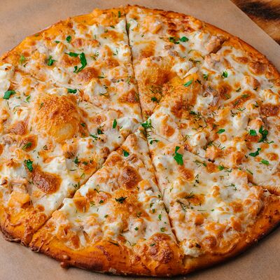 Пицца Филадельфия с начинкой из сочной семги в БлиновЪ по цене 975