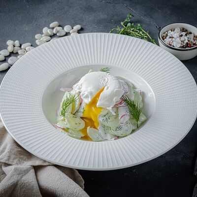 Салат Весенний с яйцом пашот в Encore Cafe по цене 840 ₽